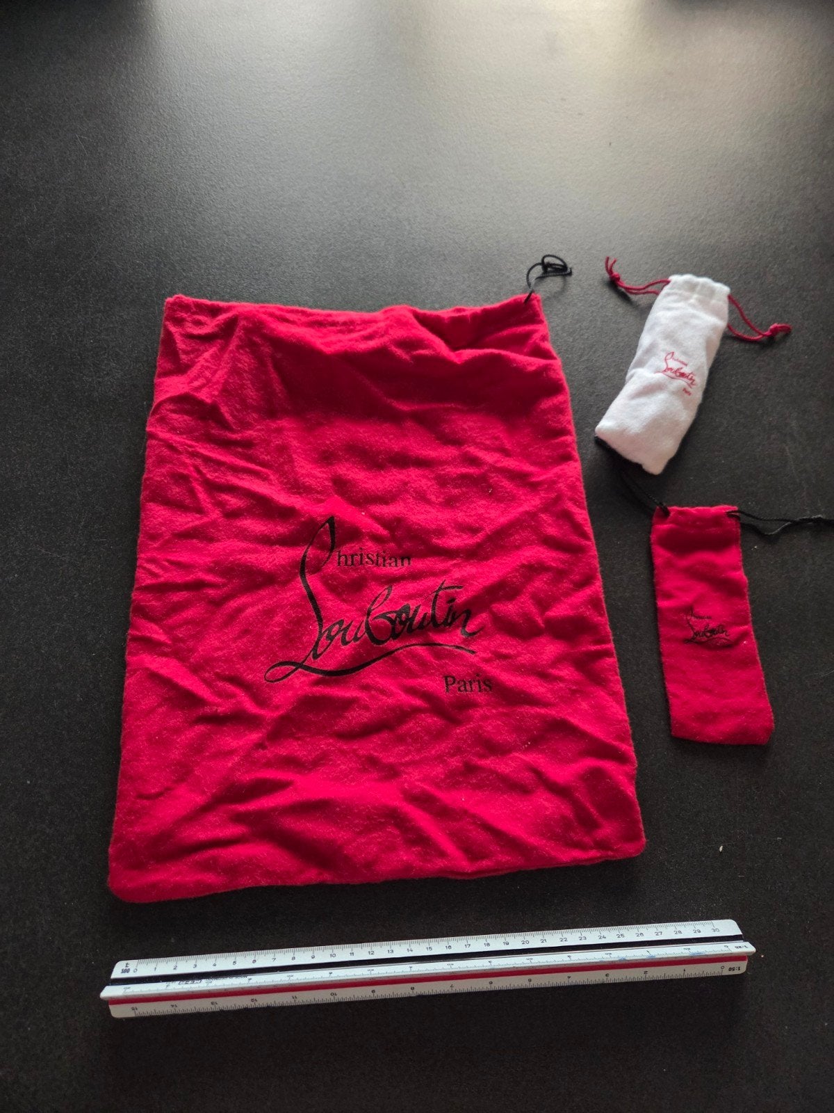 Christian Louboutin stofzakken - set van 3, Christian Louboutin, Ophalen of Verzenden, Gedragen
