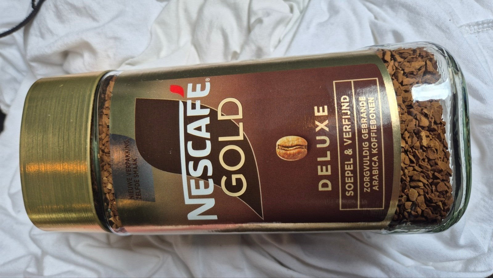 10 potten nescafe gold, Ophalen