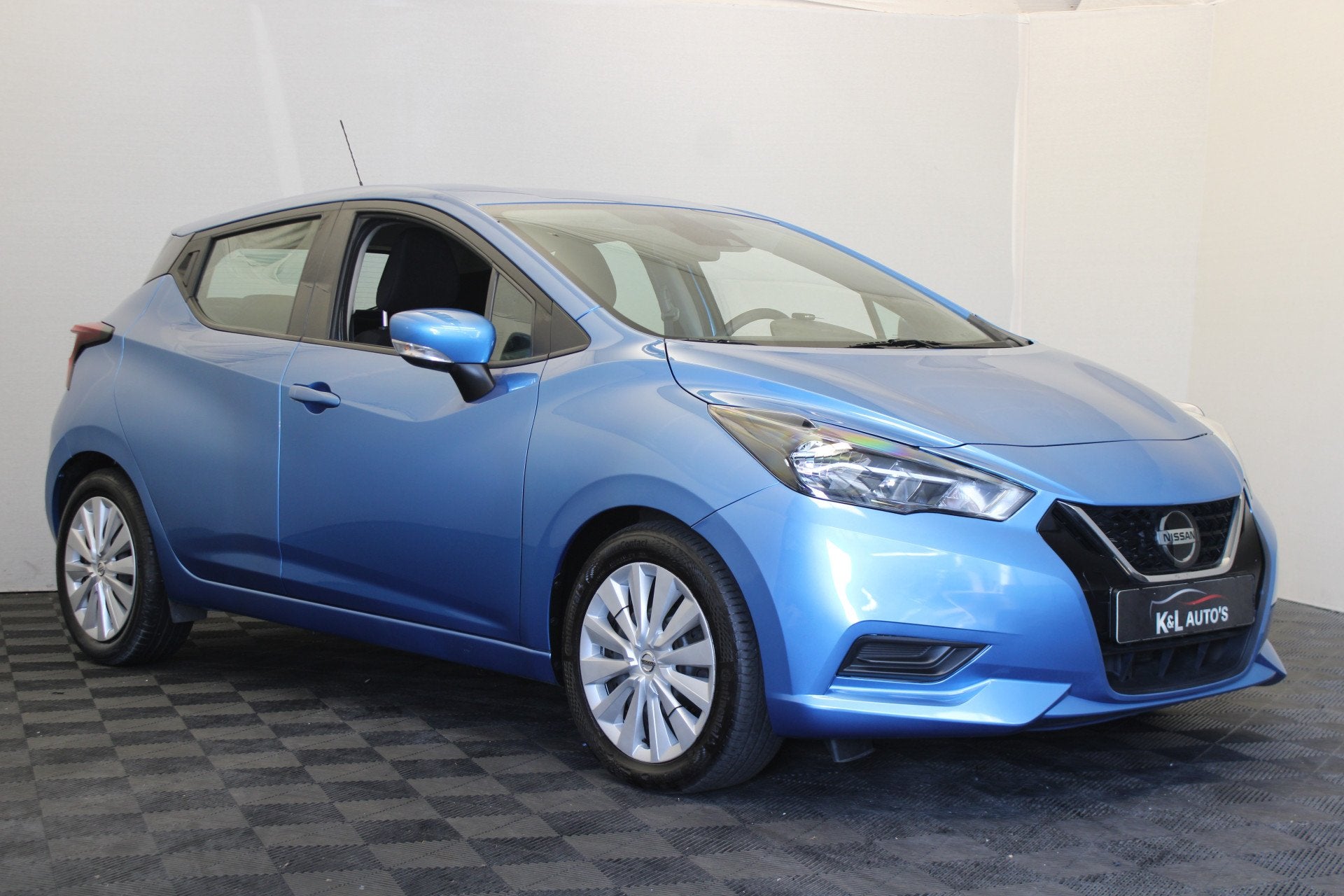 Nissan Micra 1.0 IG-T Acenta (bj 2021, automaat), Auto's, Stof, Gebruikt, Zwart, Blauw