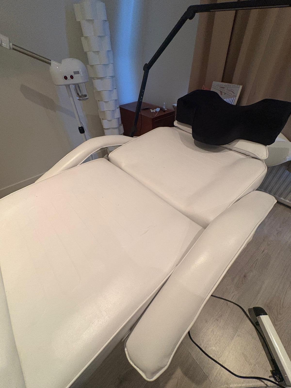 Professionele behandelstoel/massagetafel, Ophalen