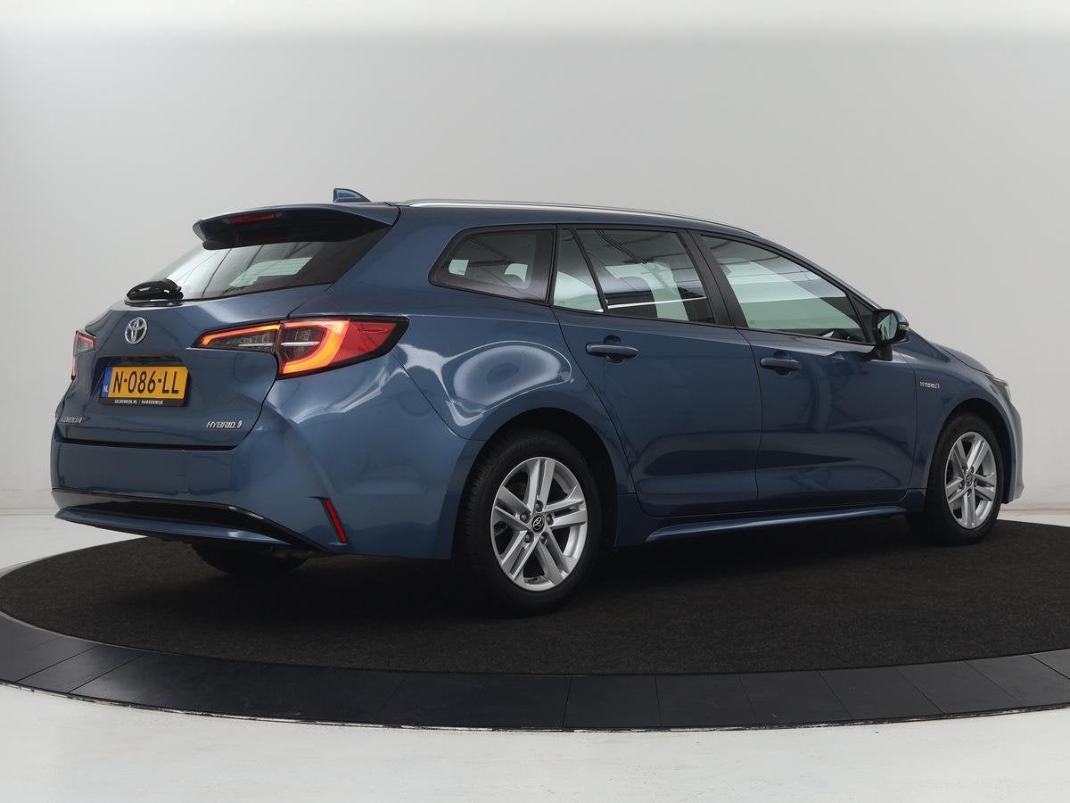 Toyota Corolla Touring Sports 1.8 Hybrid Business | Camera |, Auto's, Toyota, 1345 kg, Gebruikt, 4 cilinders, Blauw