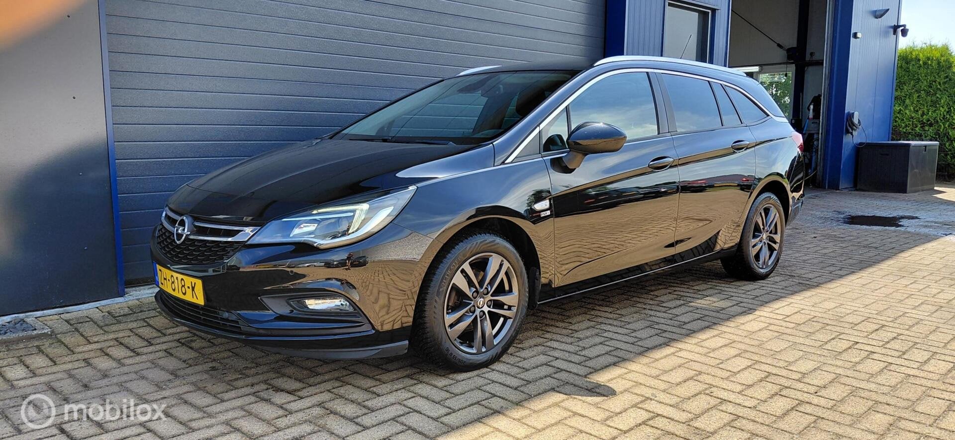 Opel Astra Sports Tourer 1.4 Turbo 120 Jaar Edition, Gebruikt, 150 pk, Zwart, Origineel Nederlands