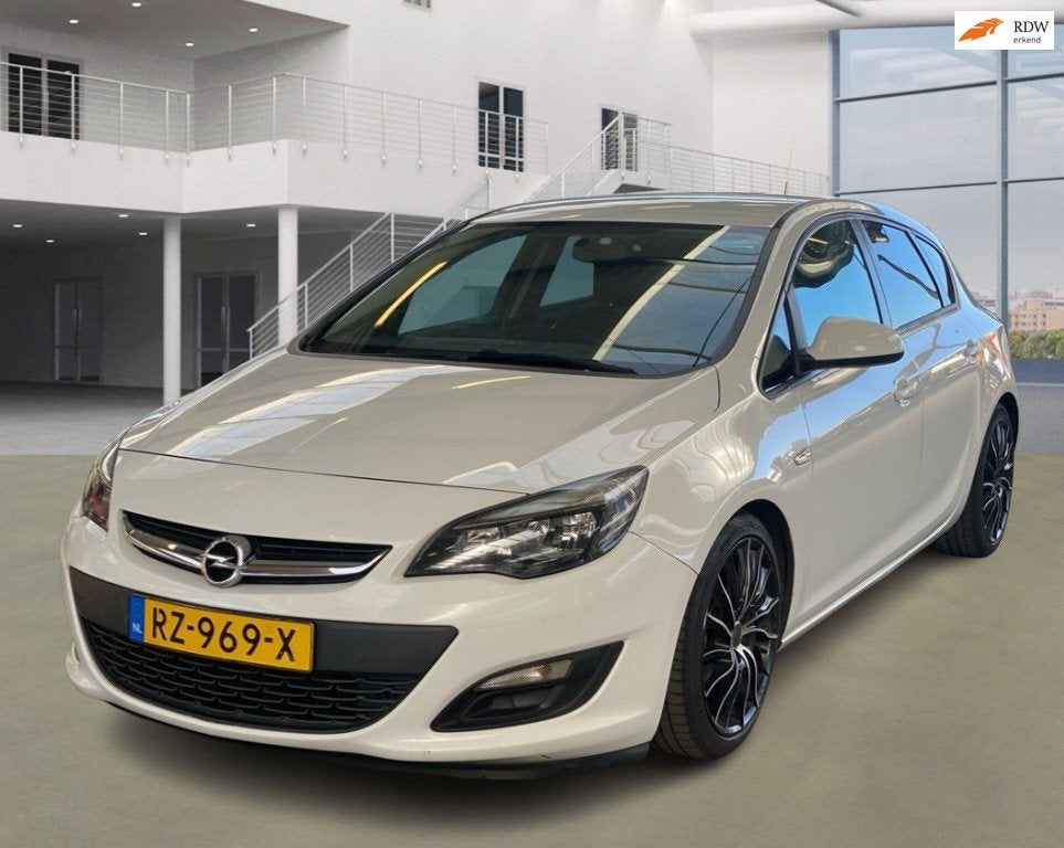 Opel Astra 1.4 Design Edition AIRCO NAVI BOEKJES, Auto's, Voorwielaandrijving, Euro 5, 101 pk, Gebruikt