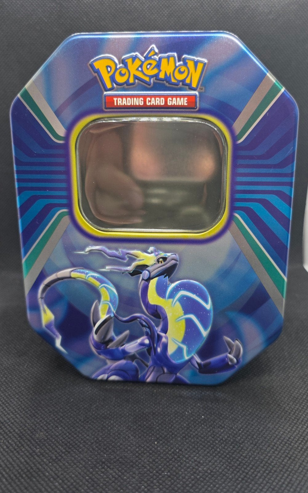 Pokémon TCG: Paldea Legends Tin (Miraidon ex), Hobby en Vrije tijd, Verzamelkaartspellen | Pokémon, Ophalen of Verzenden, Zo goed als nieuw
