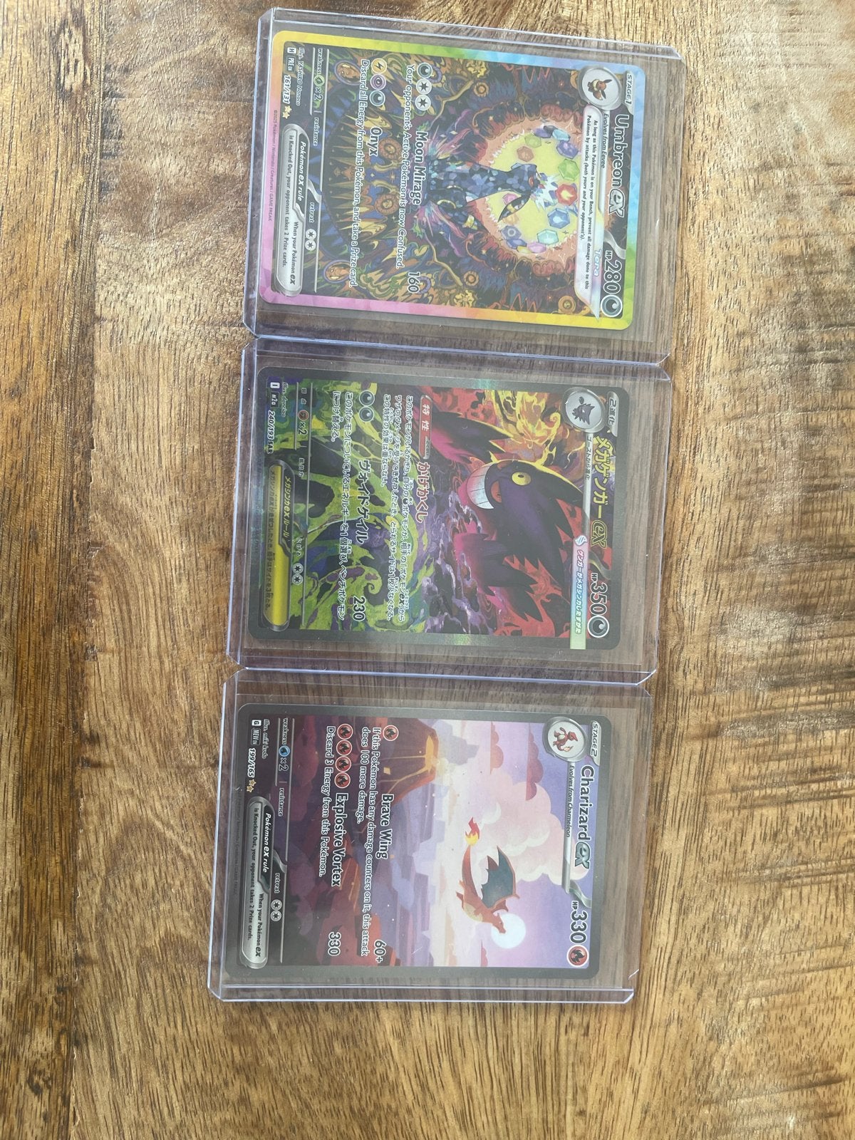 Pokémon kaarten: Umbreon, Gengar en Charizard ex, Ophalen, Zo goed als nieuw, Meerdere kaarten