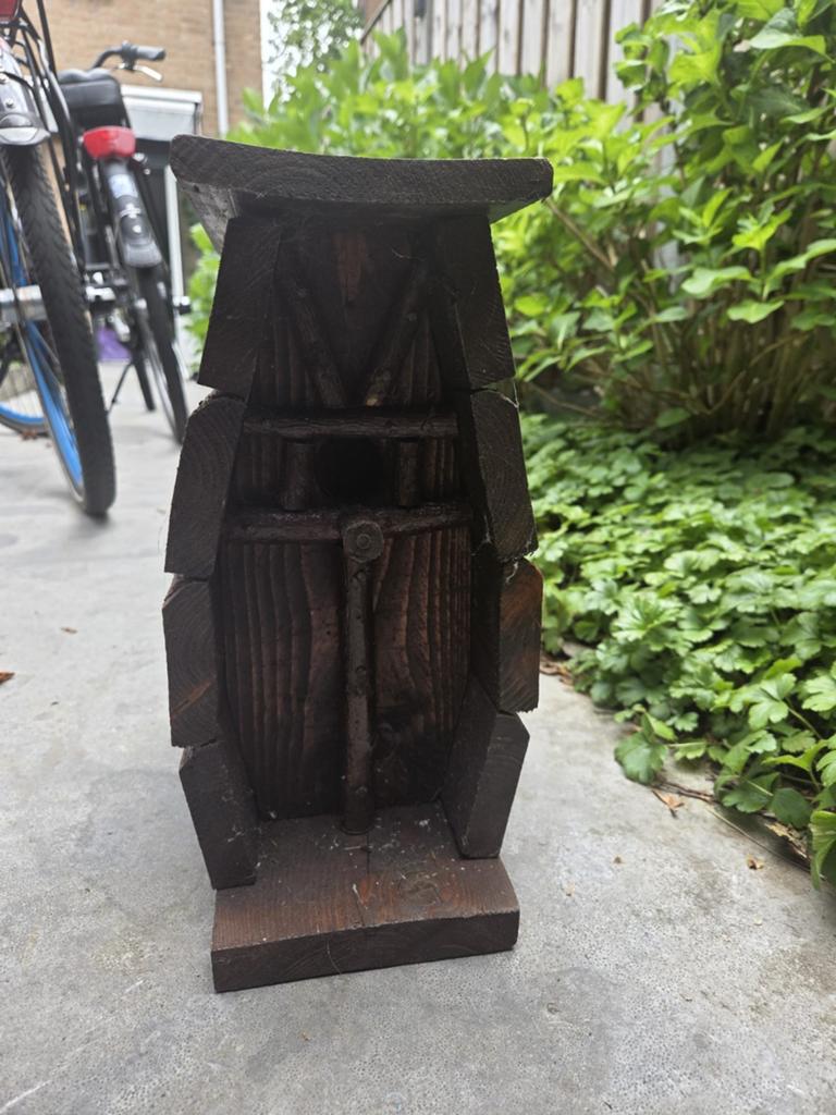 Rustiek houten vogelhuisje, Ophalen