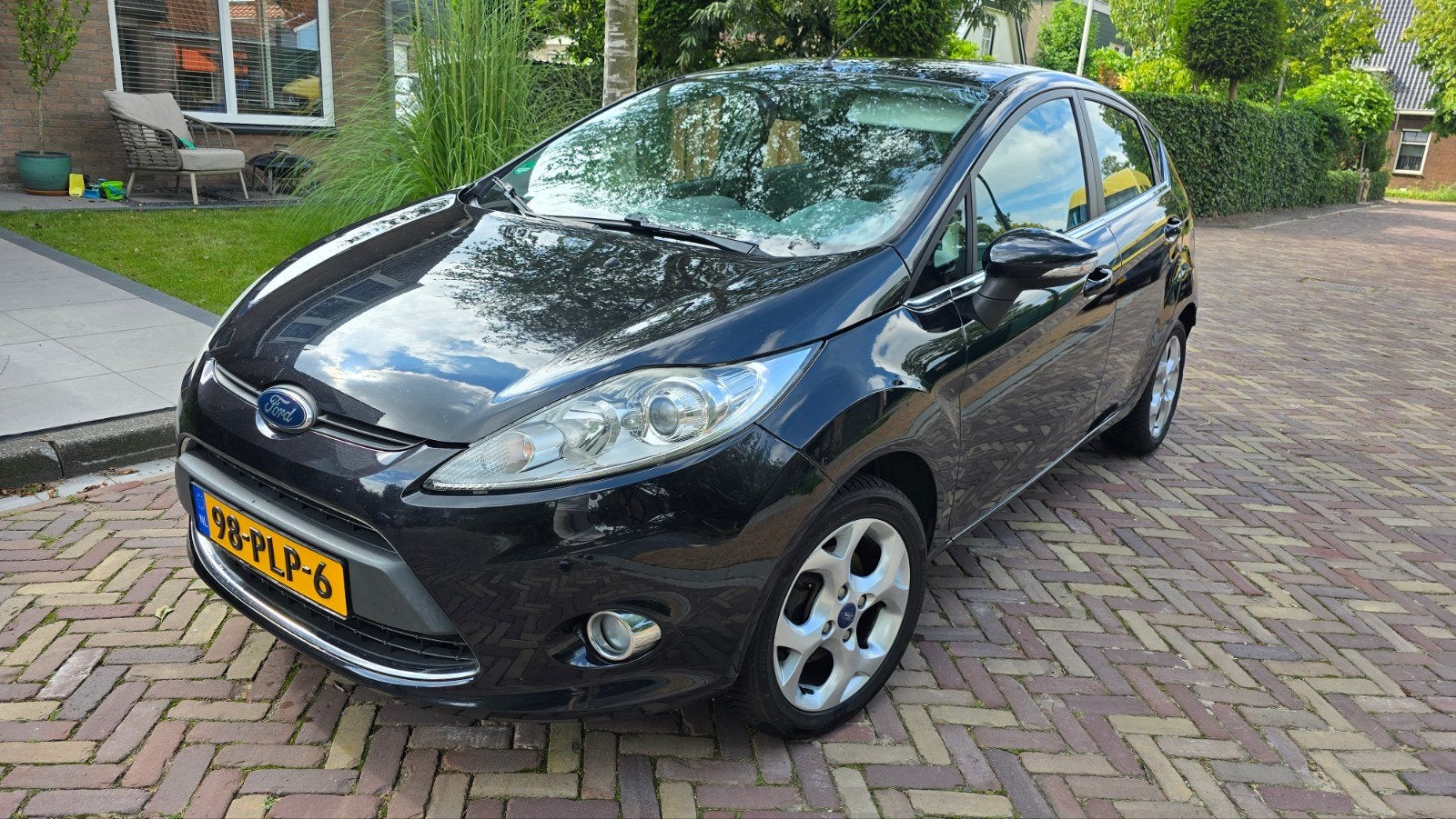 Ford Fiësta 1.25 60KW 5DR 2011 Zwart, Voorwielaandrijving, Stof, Zwart, Origineel Nederlands