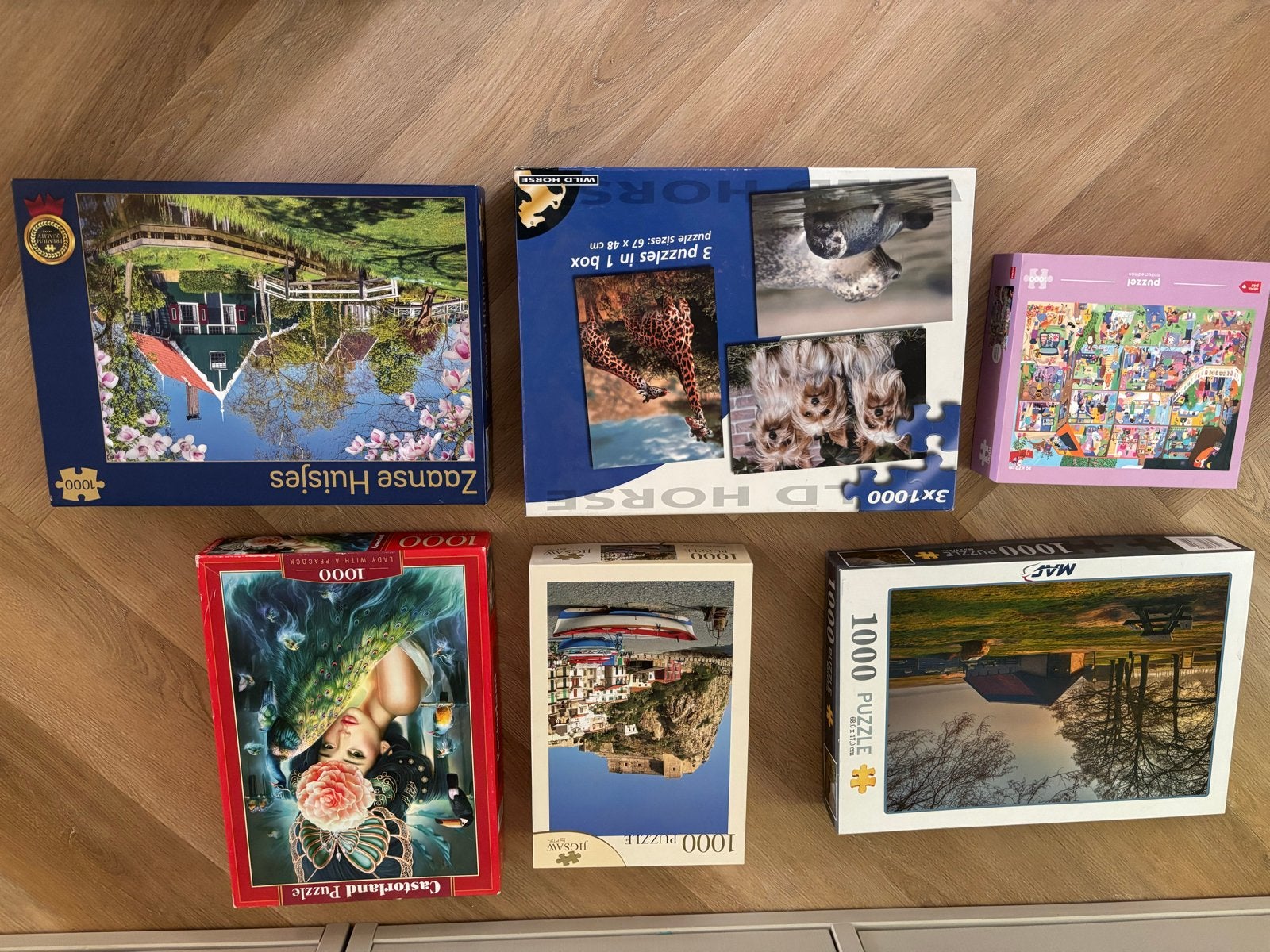 legpuzzels - diverse thema's (1000 stukjes), Ophalen of Verzenden, 500 t/m 1500 stukjes, Gebruikt, Legpuzzel