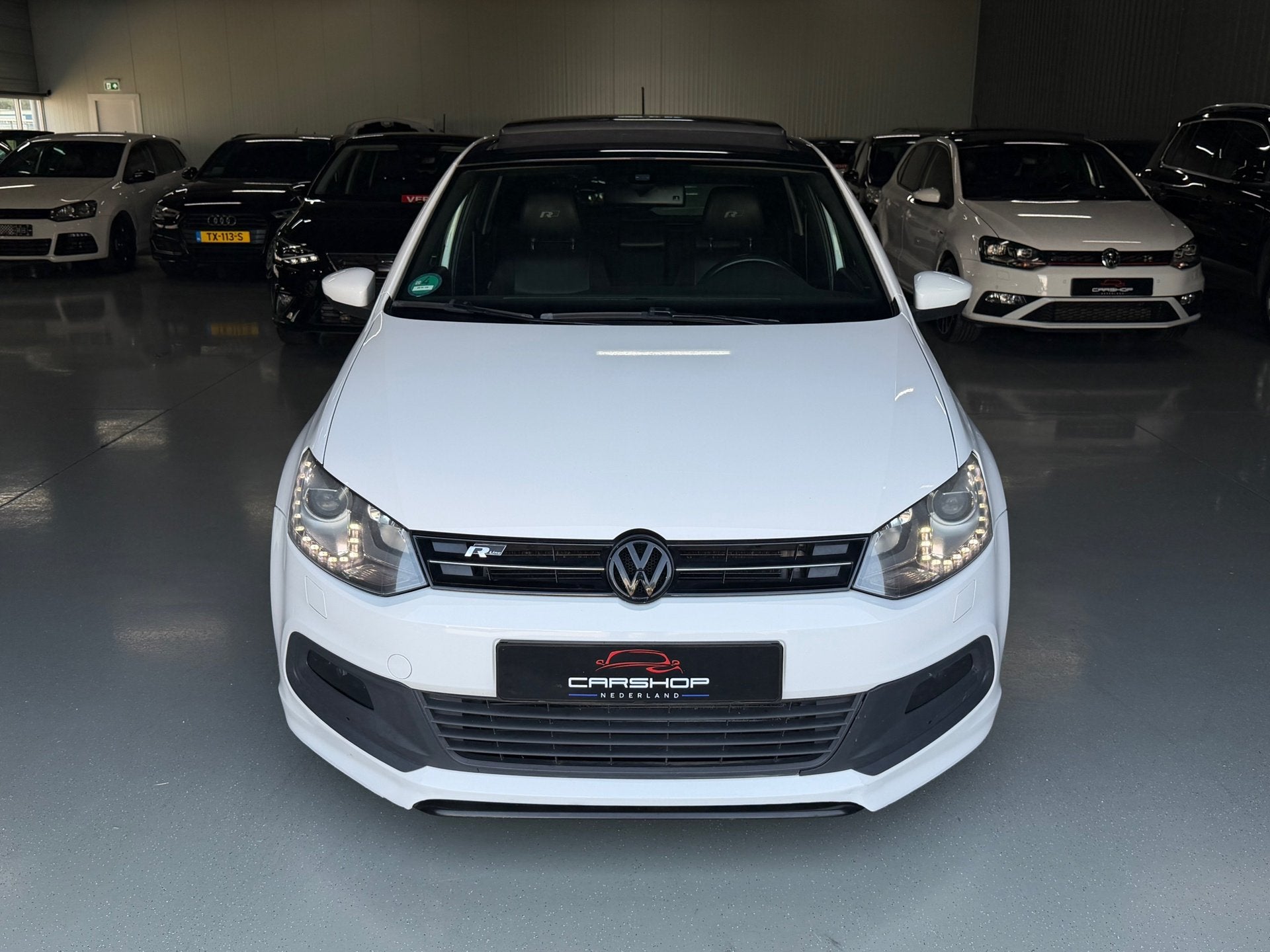 Volkswagen Polo 1.2 TSI 105PK 3X R-Line DSG/PANO/CRUISE/PDC, Auto's, Gebruikt, Zwart, 4 cilinders, Wit