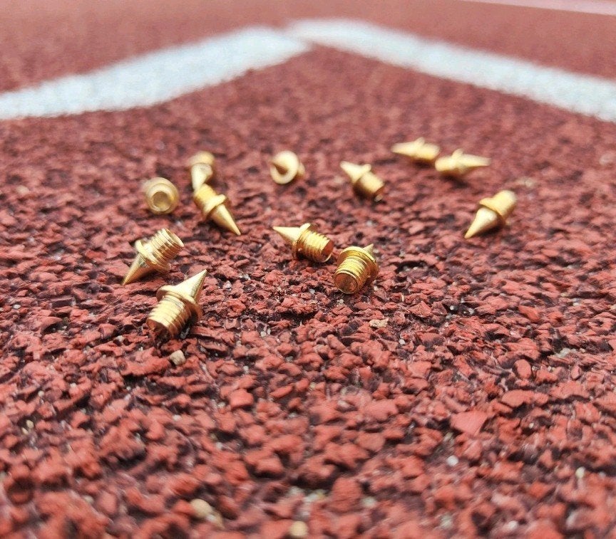 Gouden spikepuntjes atletiek, Ophalen of Verzenden, Nieuw, Goud