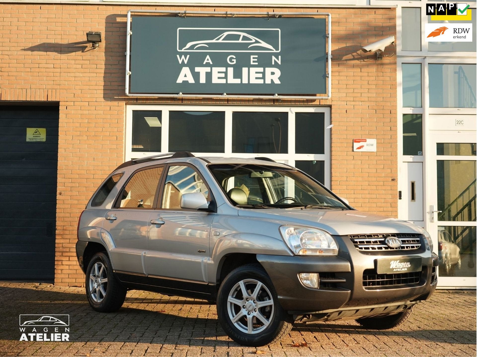 Kia Sportage 2.0 CVVT Comfort|4WD|Clima|Trek H|Cruise|Elek R, Auto's, Gebruikt, Zwart, 4 cilinders, Leder en Stof