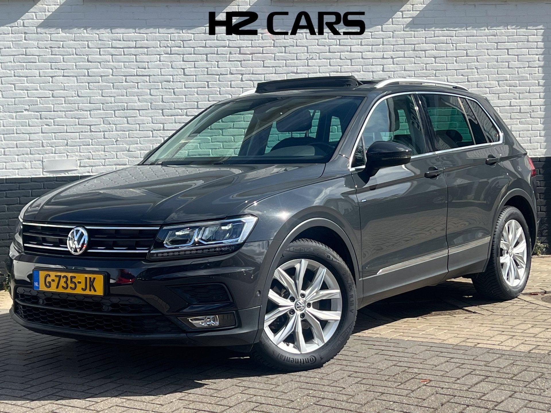 Volkswagen Tiguan 1.5 TSI ACT Highline|Pano|Trekhaak|Dodehoe, Dealer onderhouden, 4 cilinders, 150 pk, SUV of Terreinwagen