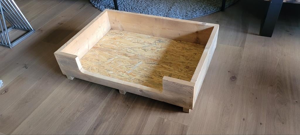 Houten hondenmand, Ophalen