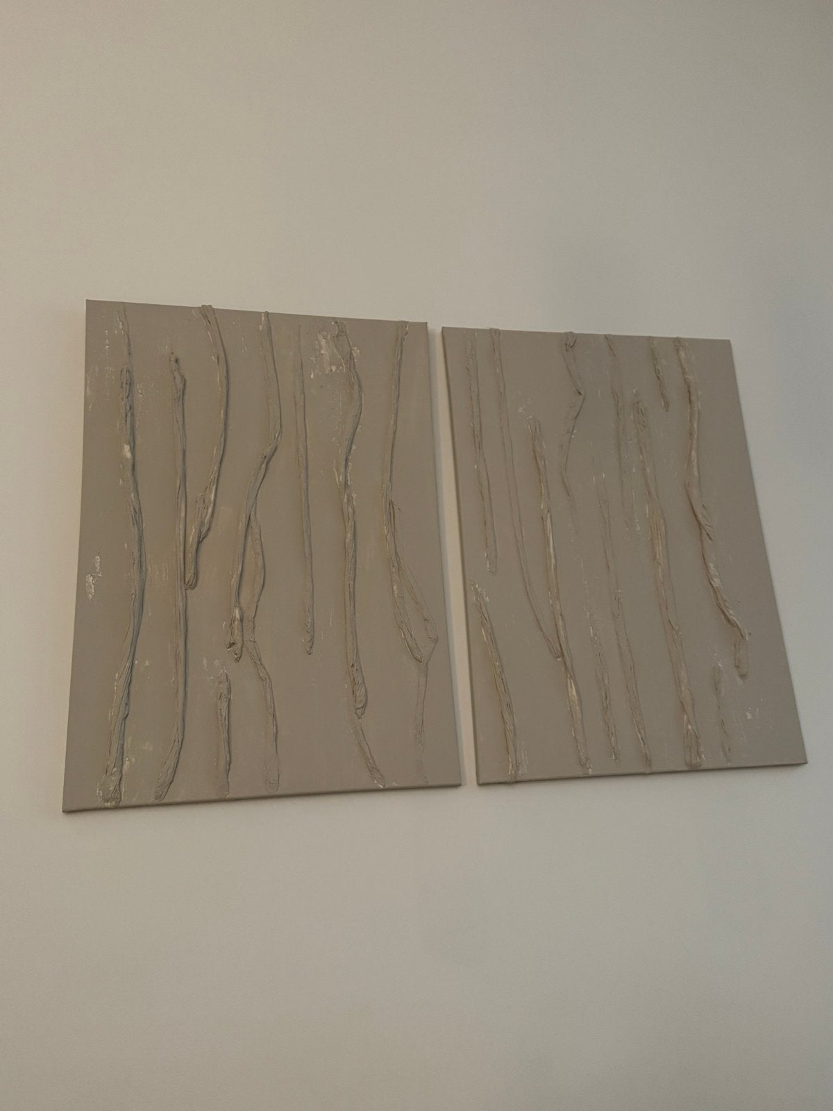 Twee beige schilderijen met textuur, Ophalen