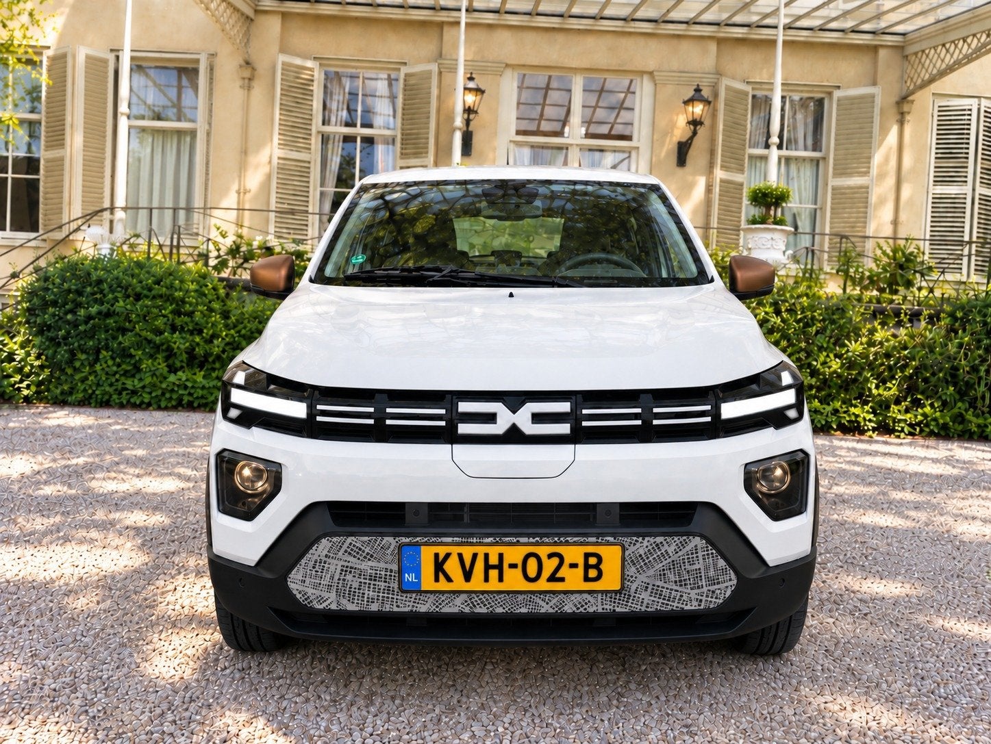Dacia Spring Extreme 65 26.8 kWh NIEUWSTAAT FABRIEKSGARANTIE, Auto's, Dealer onderhouden, Gebruikt, Parkeersensor, 4 stoelen