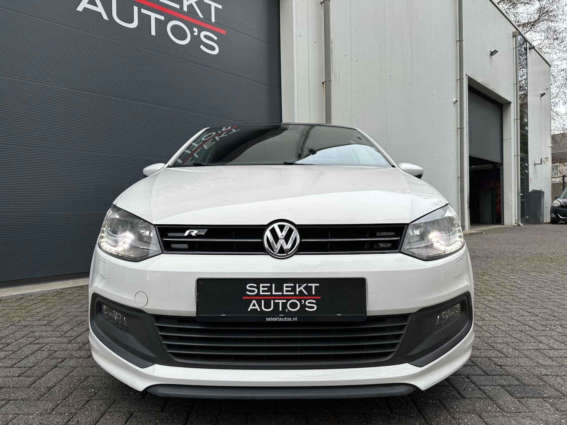 Volkswagen Polo 1.2 TSI 3x R-Line 105 Pk DSG Panoramadak/Xen, Gebruikt, Zwart, 4 cilinders, Alcantara