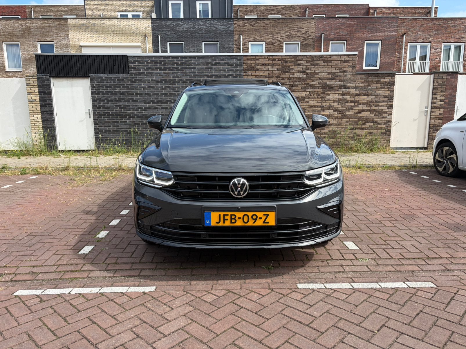 Volkswagen Tiguan 1.4TSI hybrid 245pk DSG BTW!, Auto's, Dealer onderhouden, 1800 kg, 4 cilinders, Alcantara