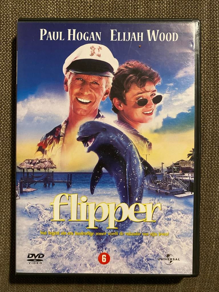 Flipper dvd - Paul Hogan & Elijah Wood - Familieavontuur, Vanaf 6 jaar, Ophalen of Verzenden, Zo goed als nieuw