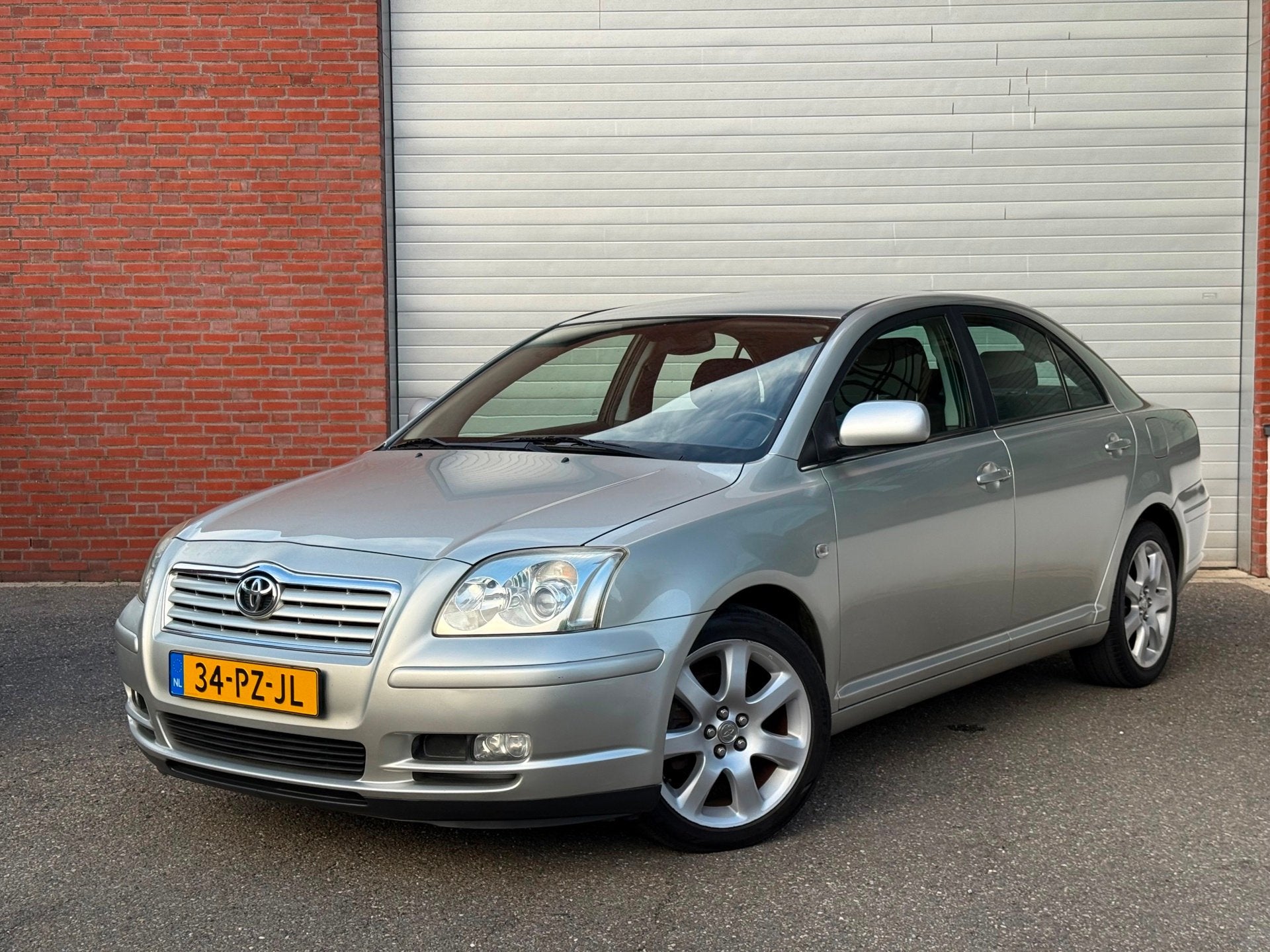 Toyota Avensis 1.8 VVTi Linea Luna| AUTOMAAT| NAP| AIRCO| NE, Auto's, Toyota, Metallic lak, Avensis, Zwart, 4 cilinders