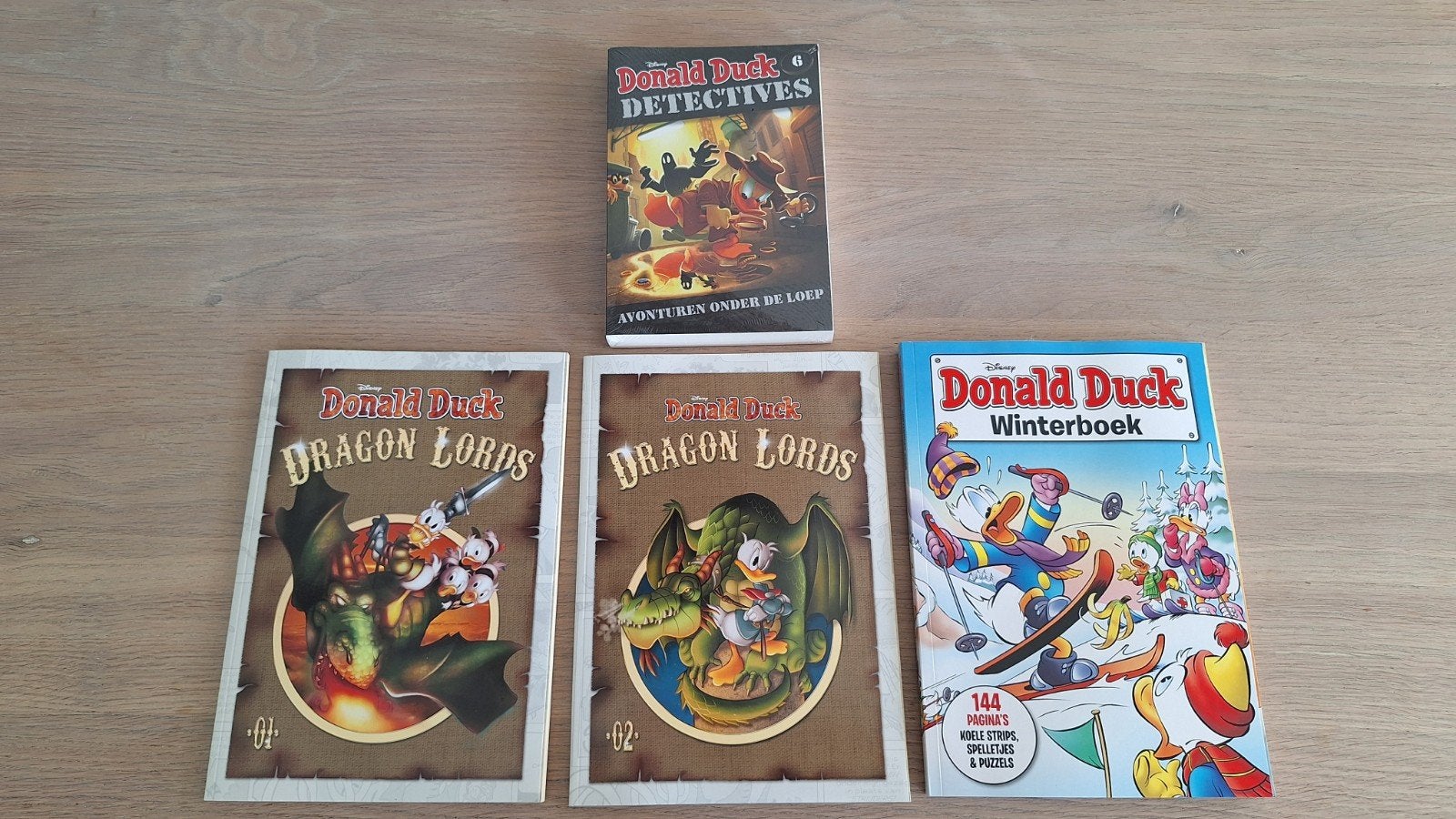 4x Donald Duck: Winterboek, Detectives, Dragon Lords 1 en 2, Boeken, Europa, Nieuw, Ophalen of Verzenden, Meerdere comics