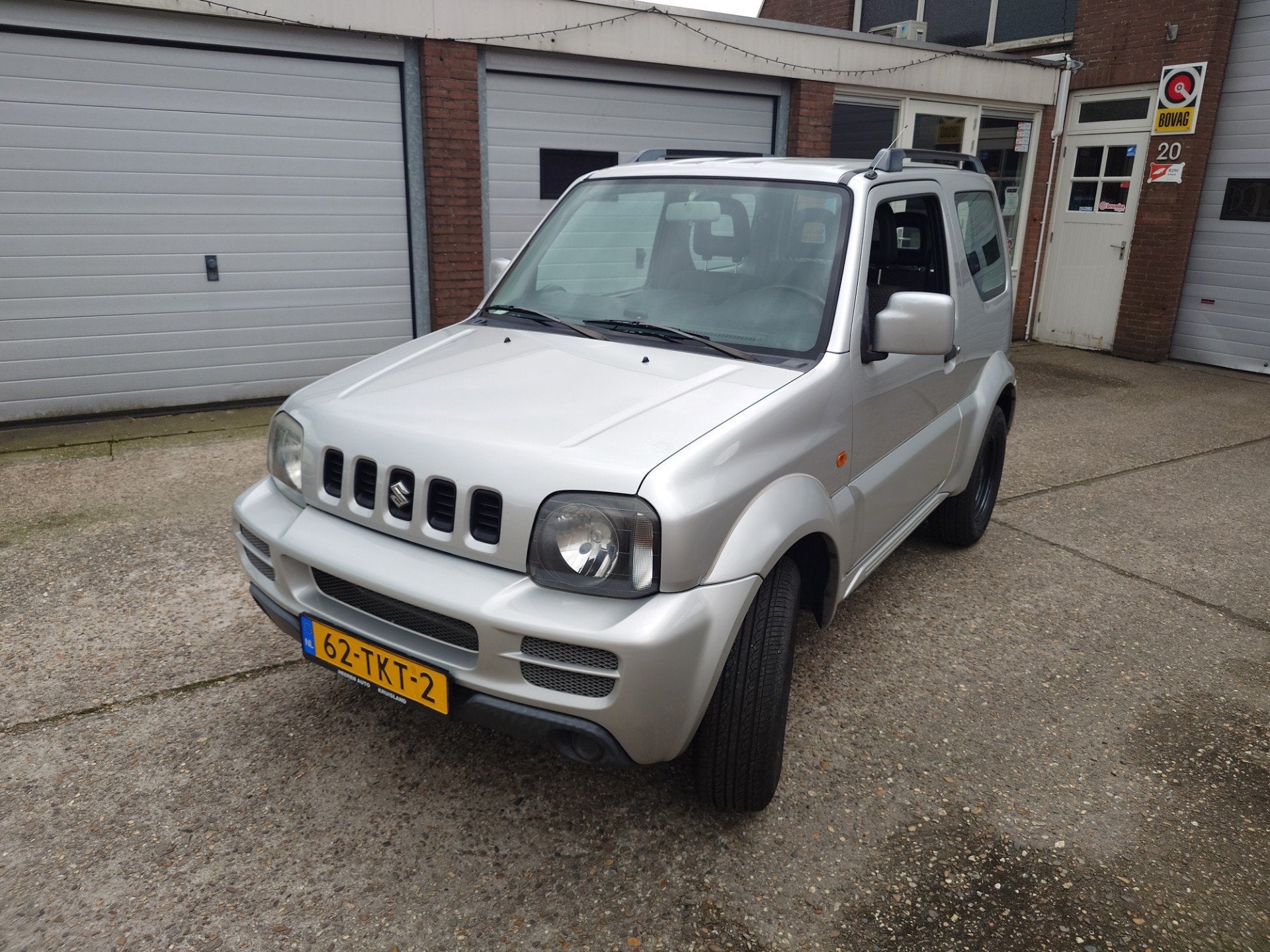 Suzuki Jimny 1.3 JLX Dealer onderhouden, Origineel NL met NA, Auto's, Keurmerk '100% Onderhouden', Zwart, 4 stoelen, Bedrijf