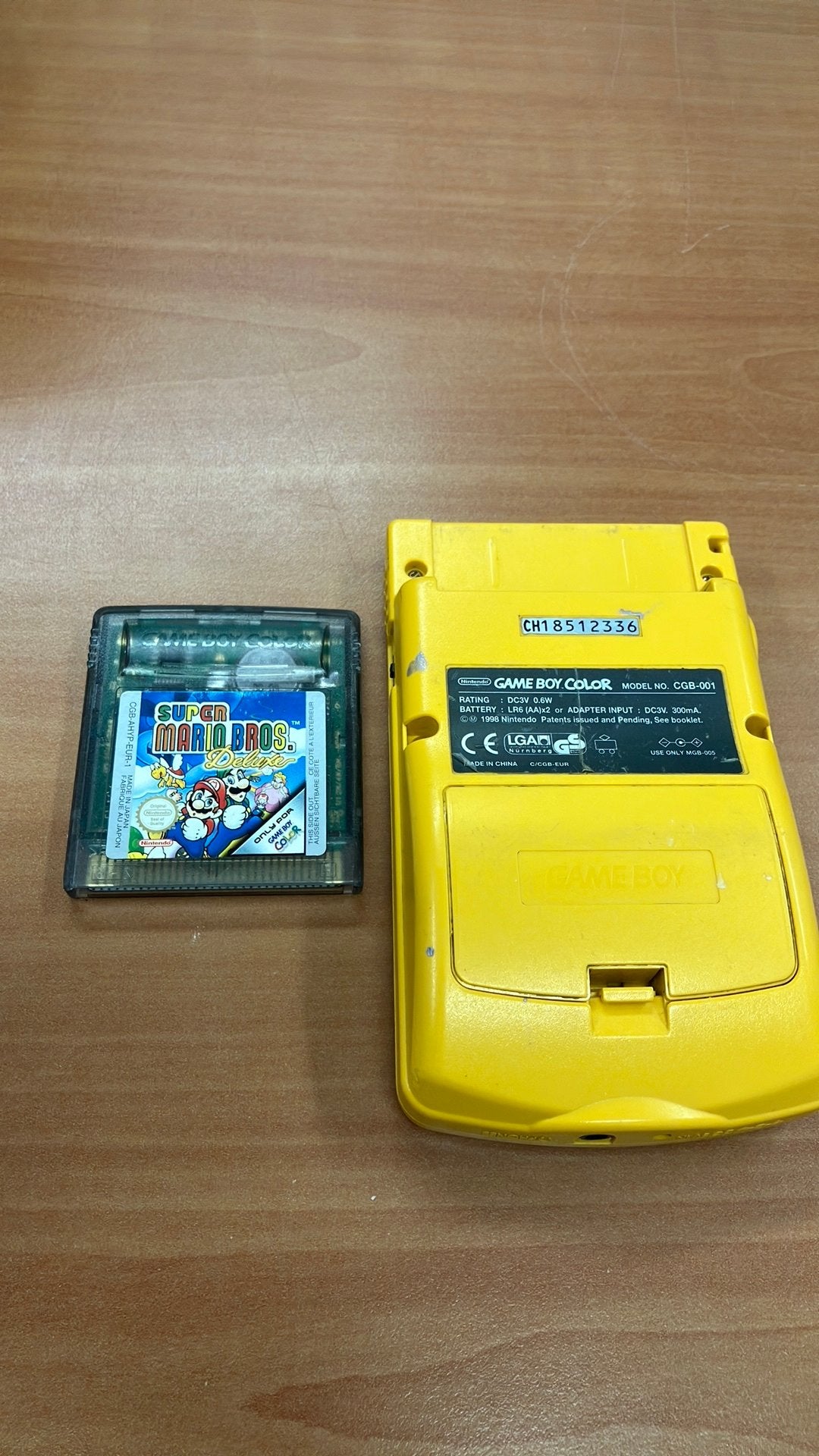 Originele Nintendo Game Boy Color + Super Mario Bros. Deluxe, Ophalen of Verzenden, Zo goed als nieuw, Game Boy Color