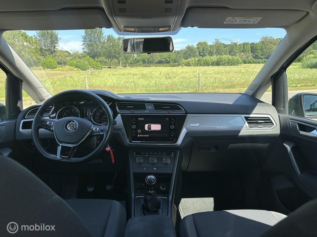 Volkswagen Touran 1.2TSI Comfortline 7-personen Trekhaak✅, Auto's, Volkswagen, Voorwielaandrijving, Stof, Gebruikt, Zwart