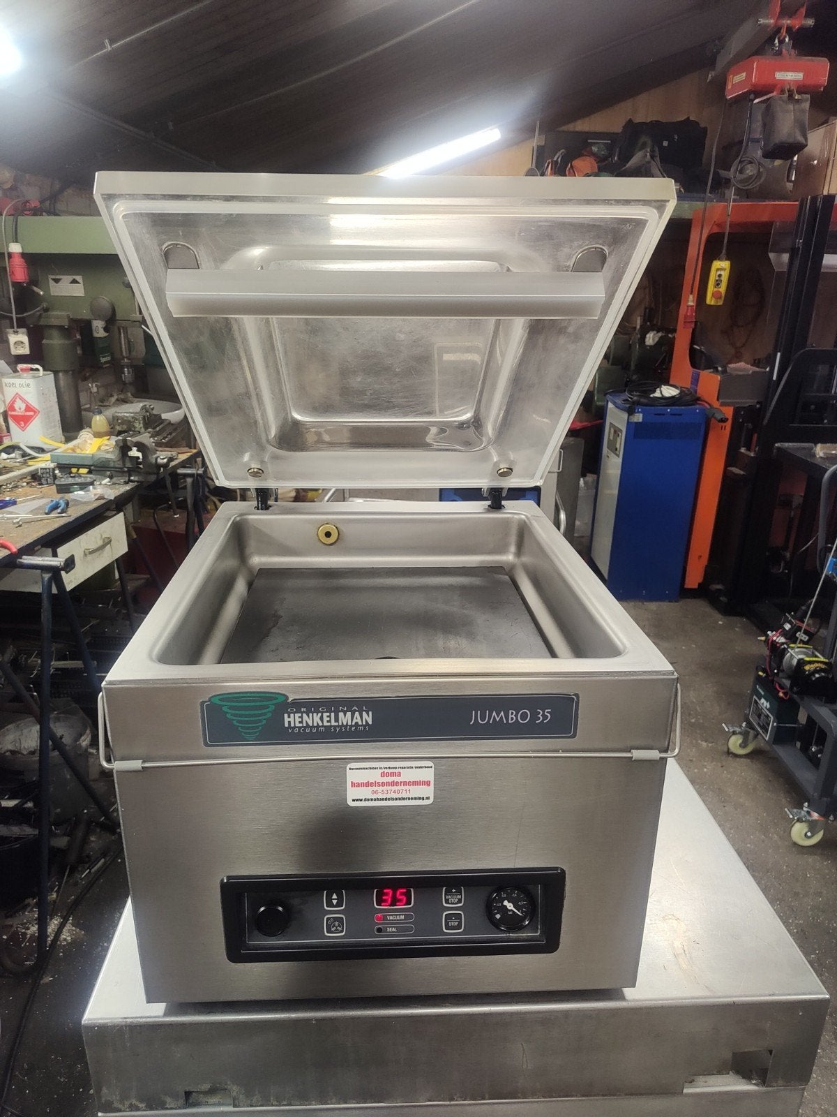 henkelman jumbo 35 vacuummachine, Ophalen