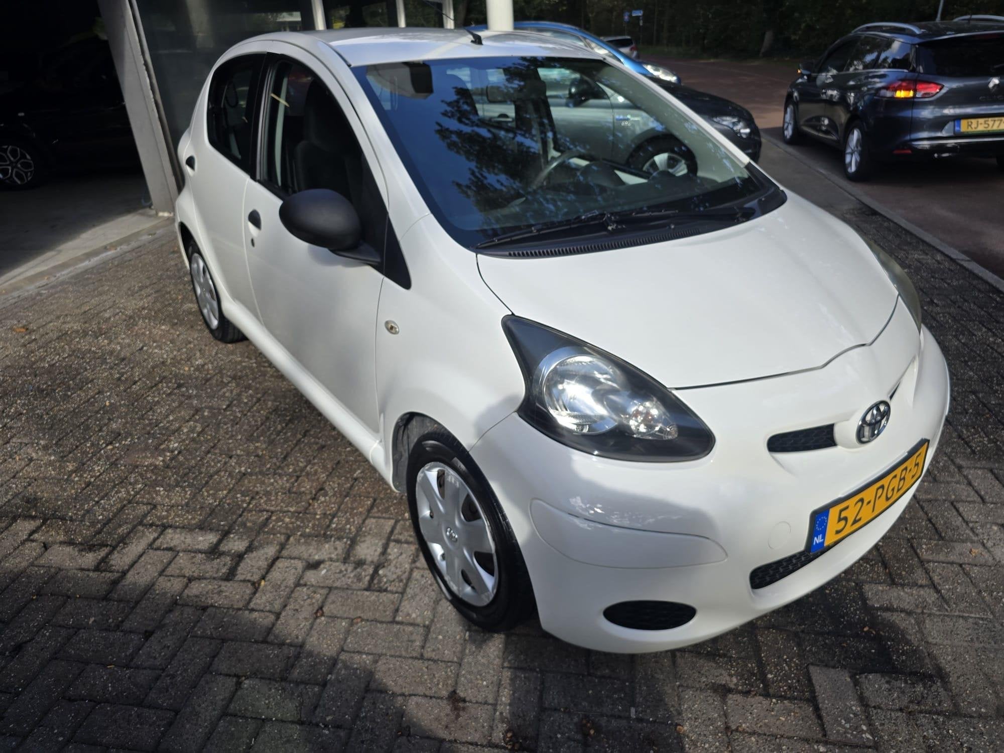 Toyota Aygo 1.0-12V Access | 1E EIGENAAR | 3/6 OF 12MND GARA, Voorwielaandrijving, Stof, Gebruikt, 4 stoelen