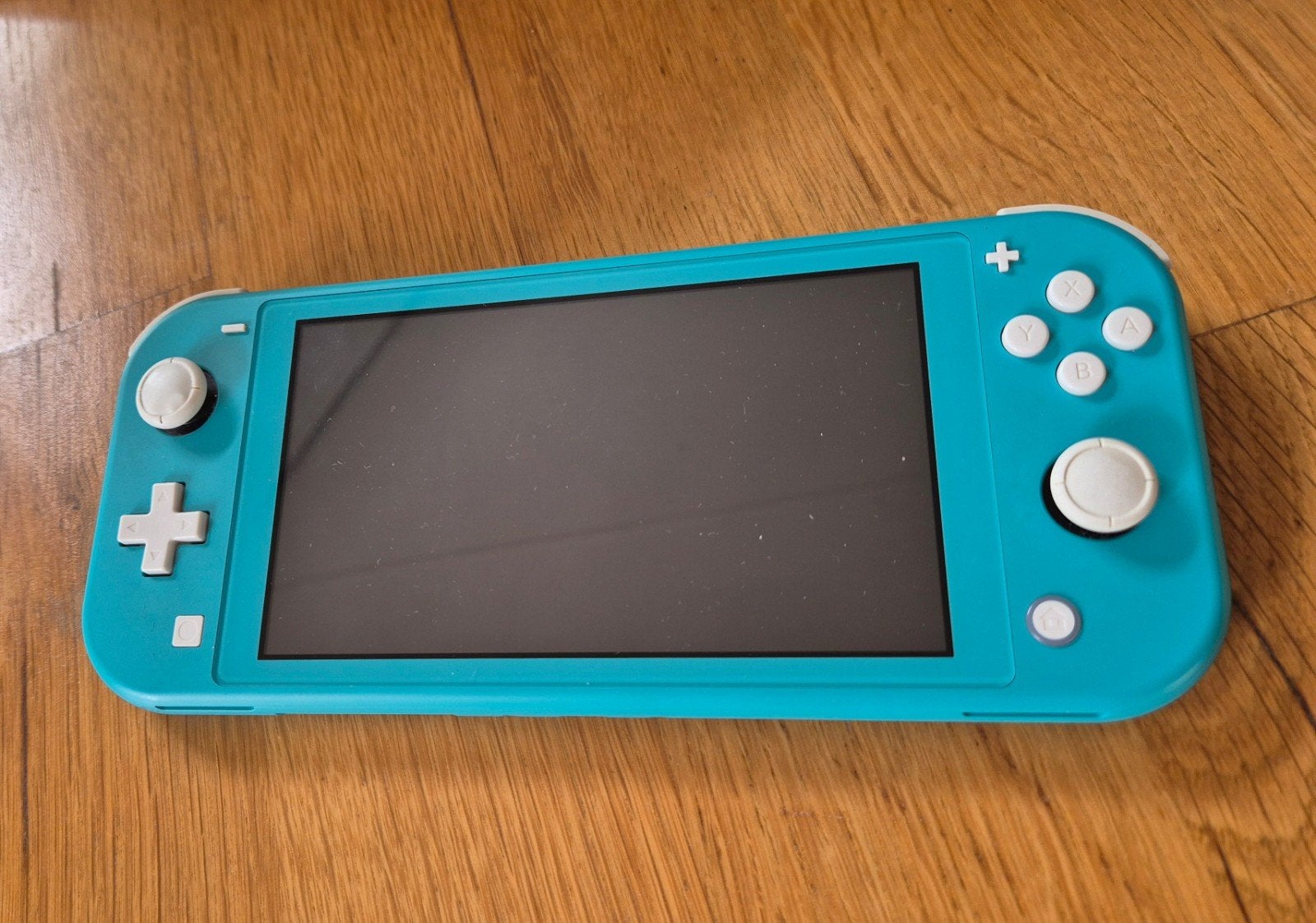 Nintendo Switch Lite Turquoise met hoes en oplader, Ophalen of Verzenden, Turquoise, Gebruikt, Met beschermhoes of tas