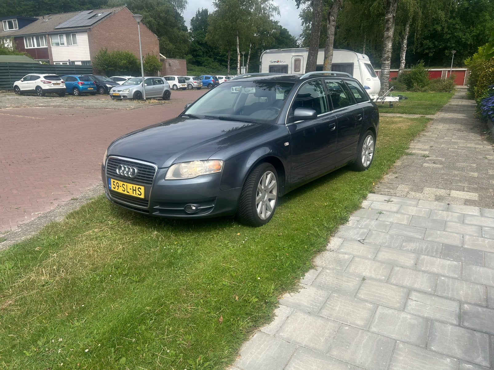 Audi A4 2.0 96KW Avant 2006 Grijs, Auto's, Audi, Voorwielaandrijving, Stof, Zwart, 4 cilinders