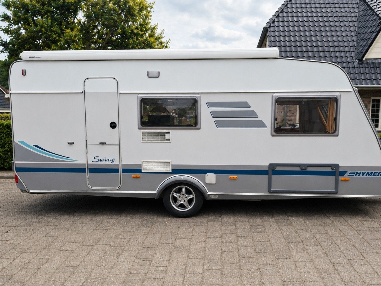 Hymer Eriba Swing 525 (2001) -Airco - 3 stapelbed + inboedel, Caravans en Kamperen, Caravans, Luifel, Vast bed, Treinzit, Particulier