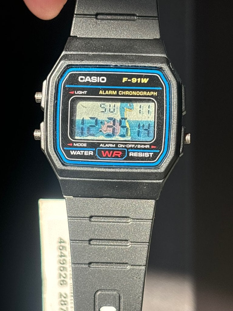 Casio F-91W - modded background / pokemon Lapras, Overige materialen, Polshorloge, Overige materialen, Nieuw