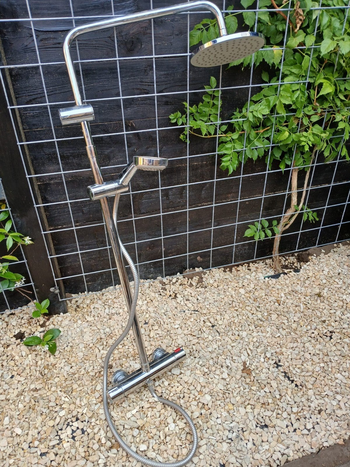 stortdouche met mengkraan, Ophalen