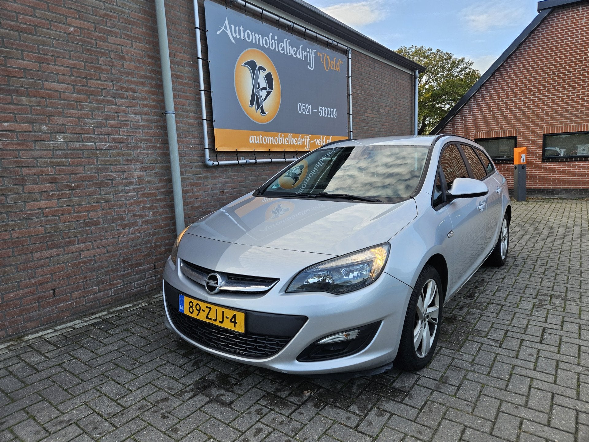 Opel Astra Sports Tourer 1.4 Cosmo (bj 2012), Voorwielaandrijving, Euro 5, Gebruikt, 4 cilinders