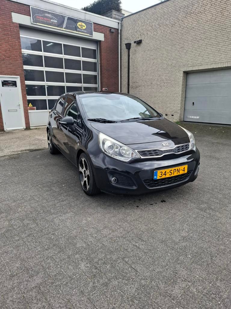Kia Rio 1.2 I 5DRS 2012 Zwart, Auto's, Kia, 40 €/maand, Zwart, 4 cilinders, Zwart