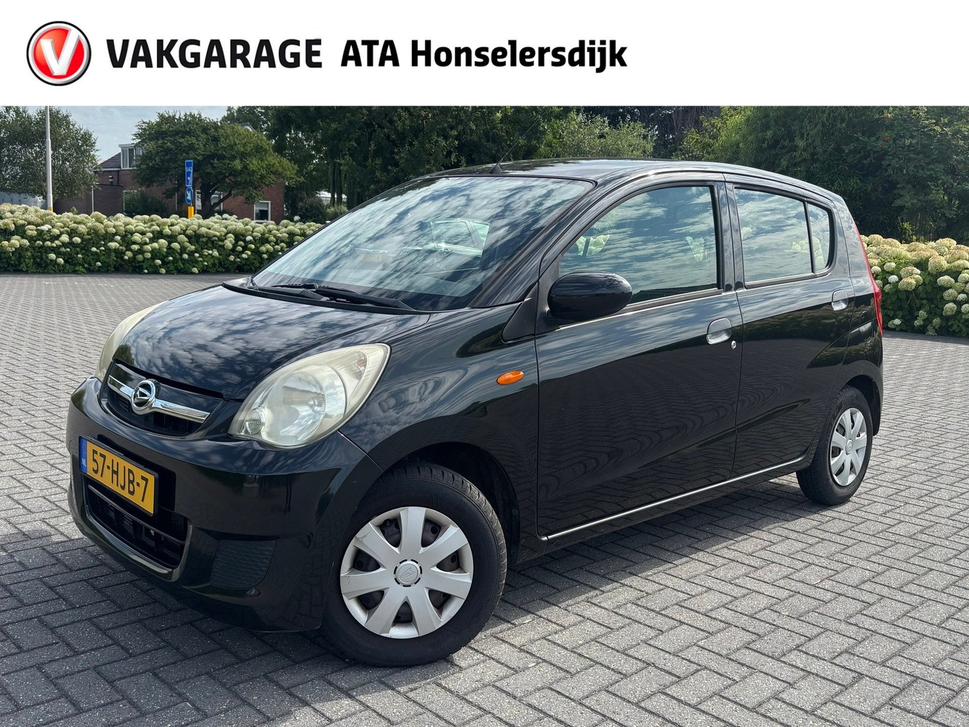 Daihatsu Cuore 1.0 Trend, Auto's, Voorwielaandrijving, Stof, Zwart, 18 €/maand