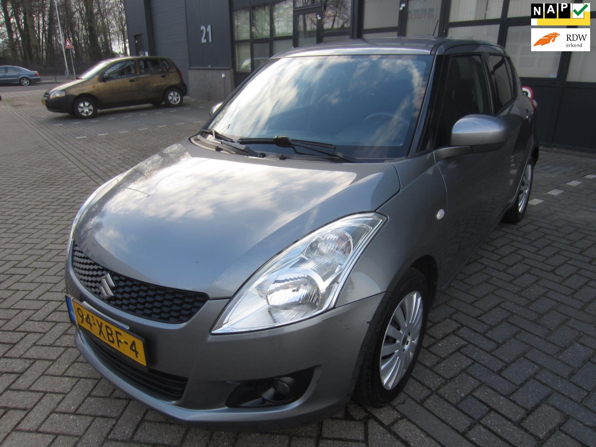 Suzuki Swift 1.2 Exclusive EASSS 2012 Airco Cruise 5-Deurs N, Voorwielaandrijving, Gebruikt, 4 cilinders, 400 kg