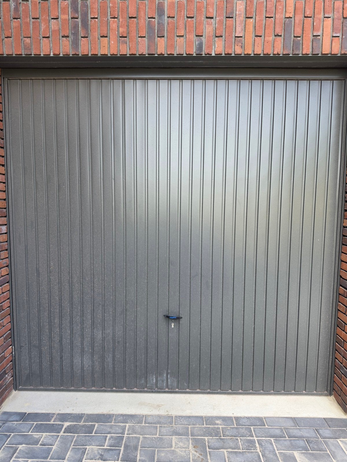 Zo goed als nieuwe Garagedeur, Ophalen