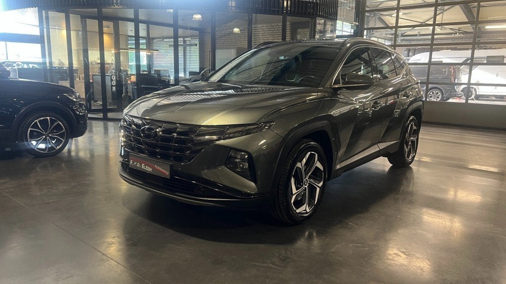 Hyundai TUCSON 1.6 T-GDI HEV Premium 230 Pk Automaat 1650 kg, Auto's, Gebruikt, Huisgarantie, 4 cilinders, Met garantie (alle)