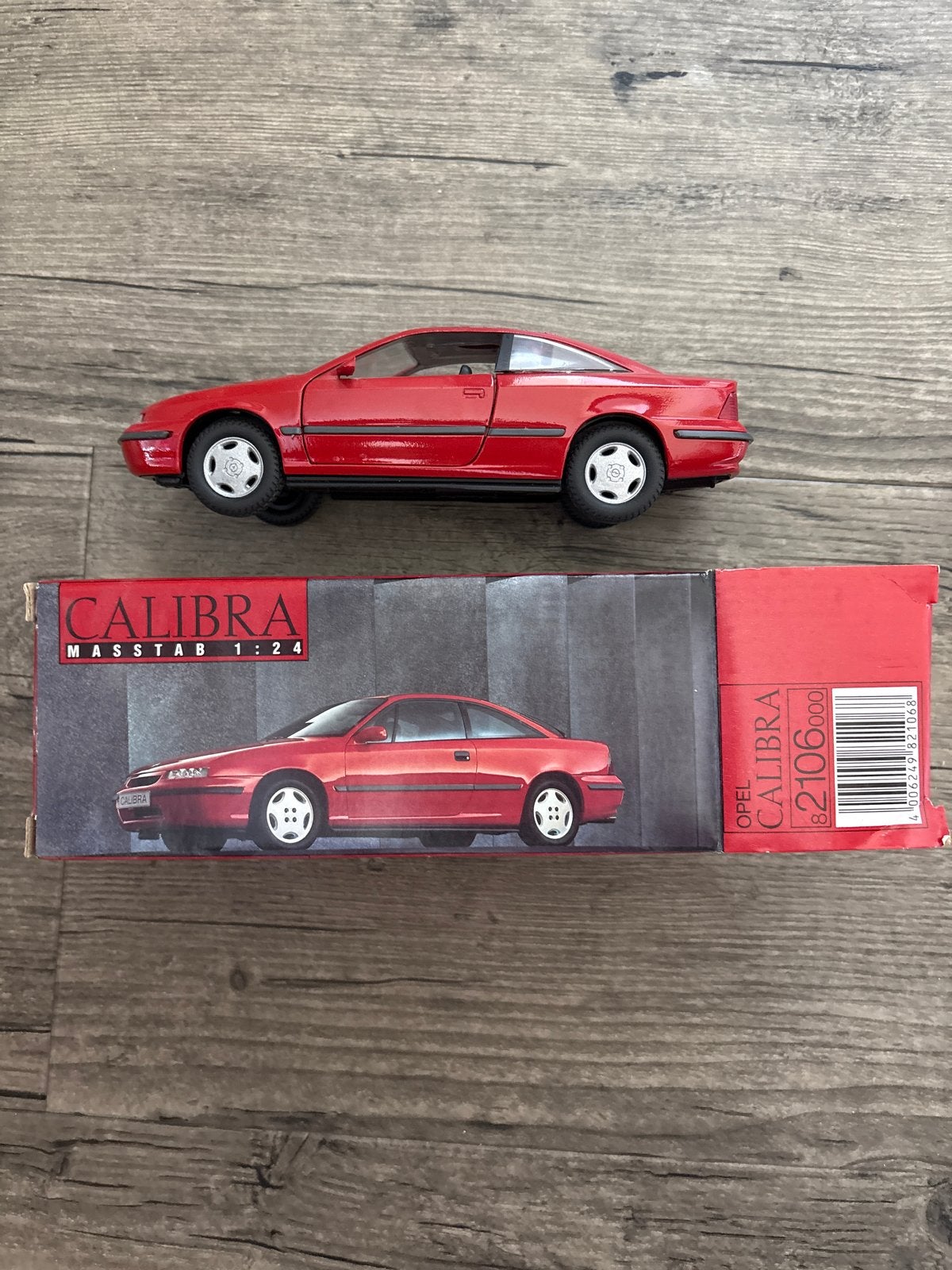 Opel Calibra schaalmodel 1:24 - Rood, Ophalen of Verzenden, Zo goed als nieuw, Auto, Overige merken