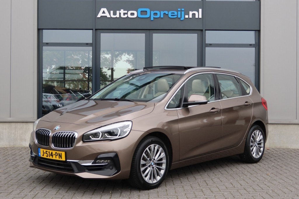 Bmw 2-SERIE 218i Active Tourer AUTOMAAT High Executive  NAVI, Auto's, BMW, Gebruikt, Euro 6, USB, Beige