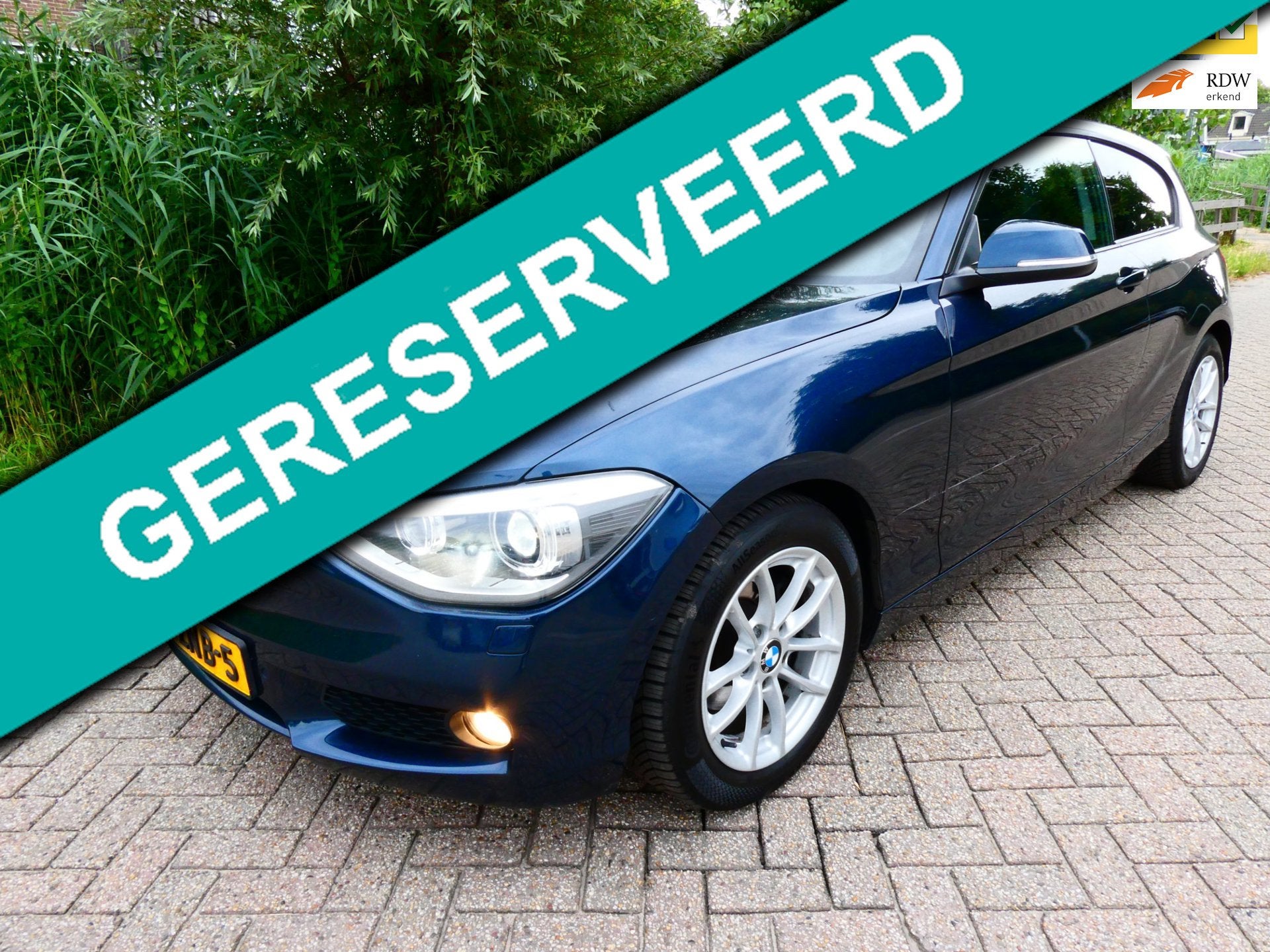 BMW 1-serie 116i 3-deurs 136pk 4-Cil. Airco Cruise Leder Nav, 1-Serie, Euro 5, Gebruikt, Zwart