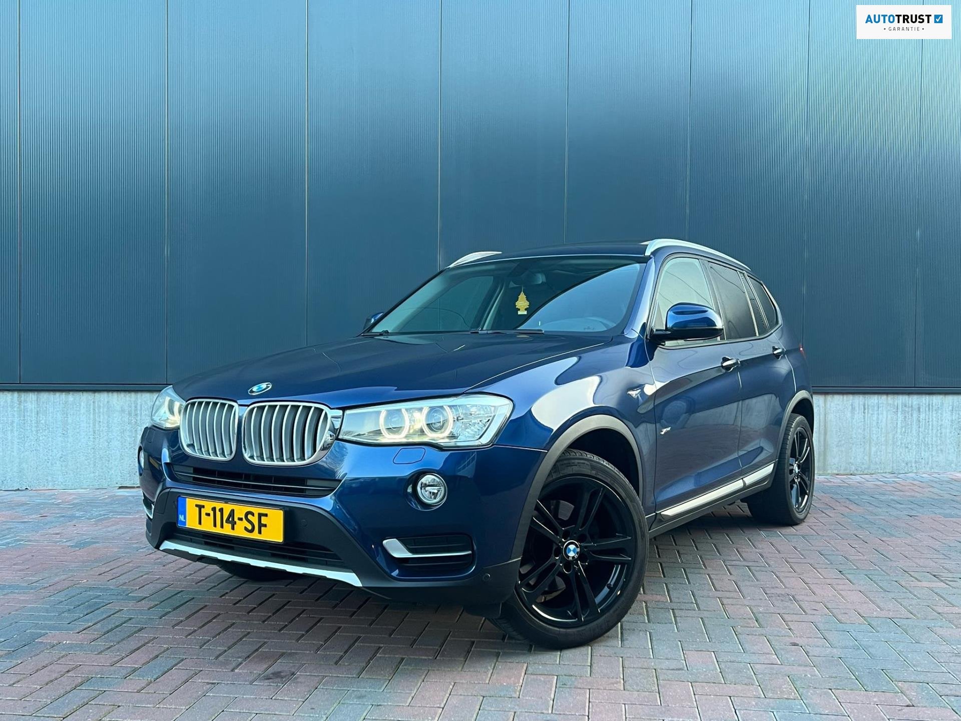 BMW X3 XDrive20d High executive X-Line * Aut * Navi * Cruise, Auto's, Automaat, Dealer onderhouden, Zwart, Blauw