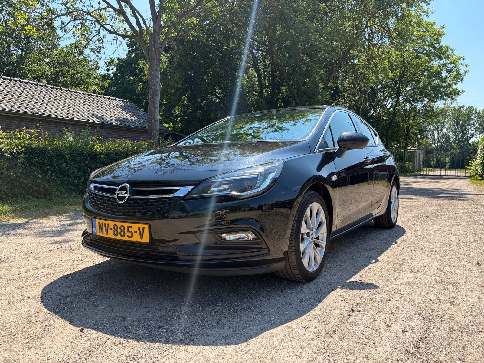 Opel Astra 1.4 Turbo Innovation, Zwart, 4 cilinders, Lichtsensor, 620 kg