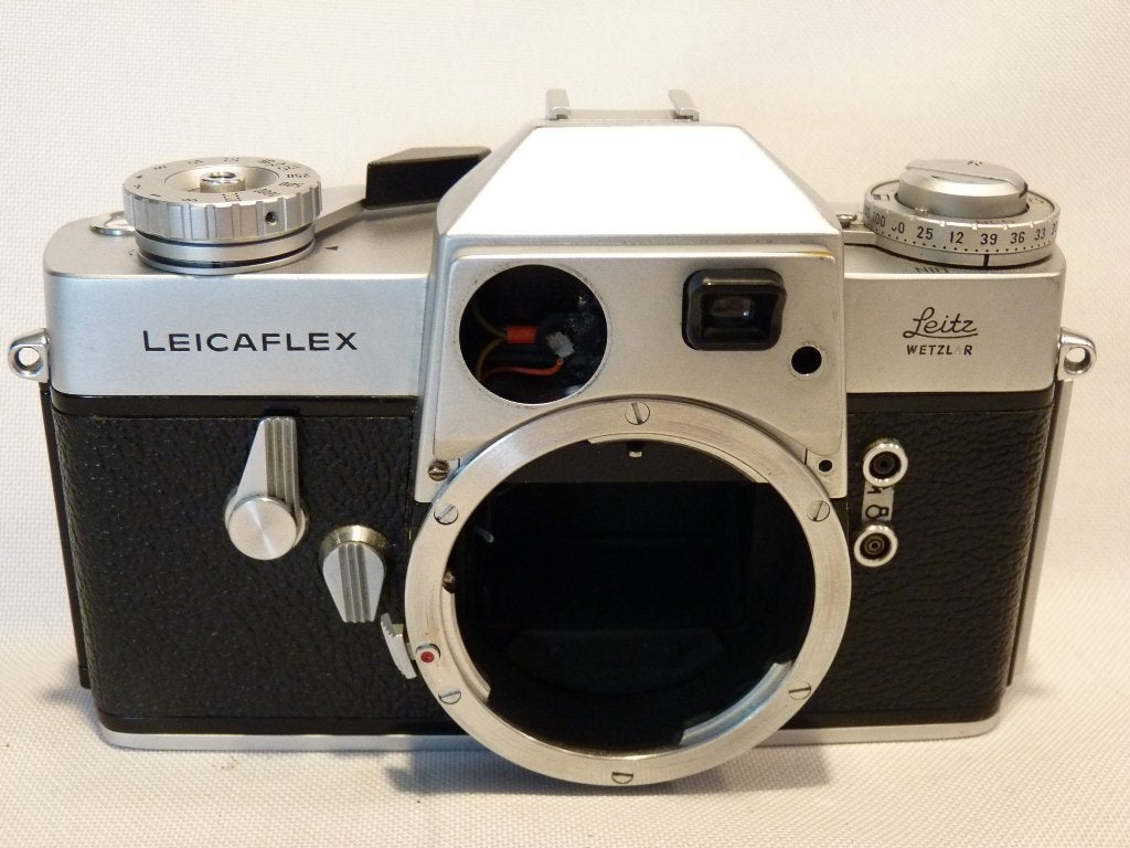 Leica  Leicaflex, defect, voor onderdelen., Audio, Tv en Foto, Fotocamera's Analoog, Ophalen of Verzenden, Niet werkend, Spiegelreflex