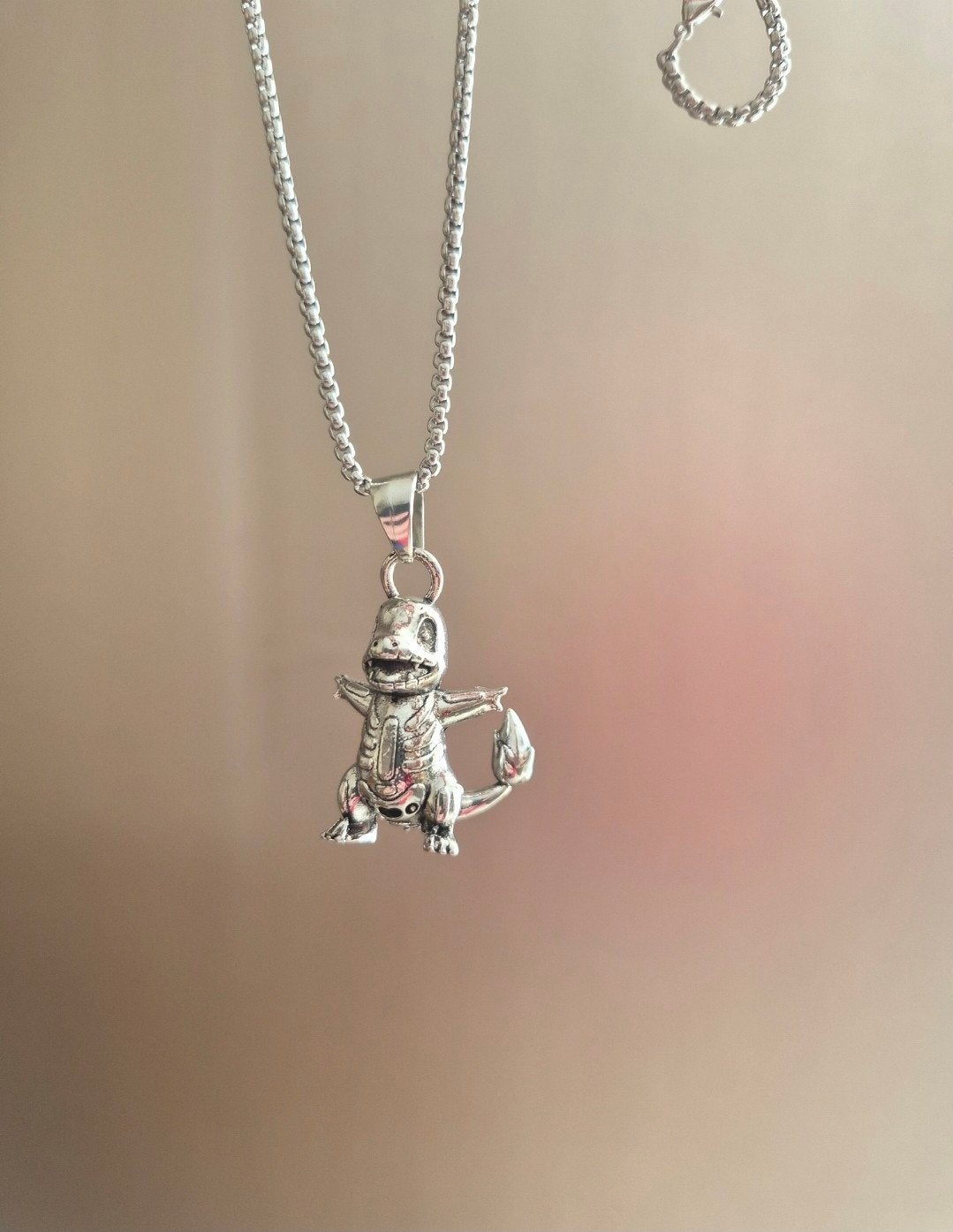 Zilverkleurige Pokémon Charmander ketting, Ophalen of Verzenden, Zo goed als nieuw, Zilver, Overige materialen