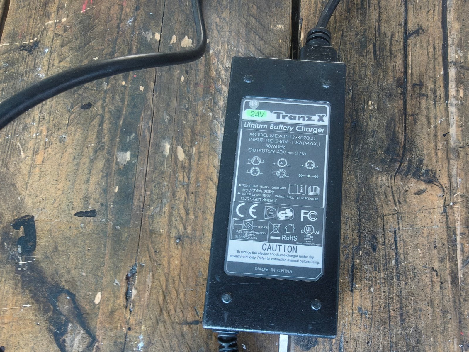 Oplader TranzX 24 volt 4 pins aansluiting, Ophalen of Verzenden, Zo goed als nieuw