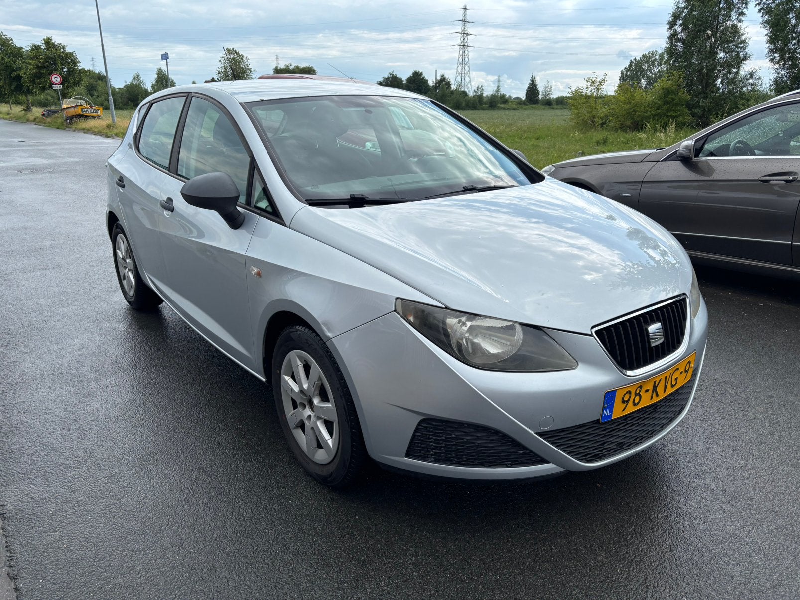 Seat Ibiza 1.2 5DRS Airco/Scherm 2010 Grijs, Auto's, Voorwielaandrijving, 40 €/maand, 1198 cc, Ibiza
