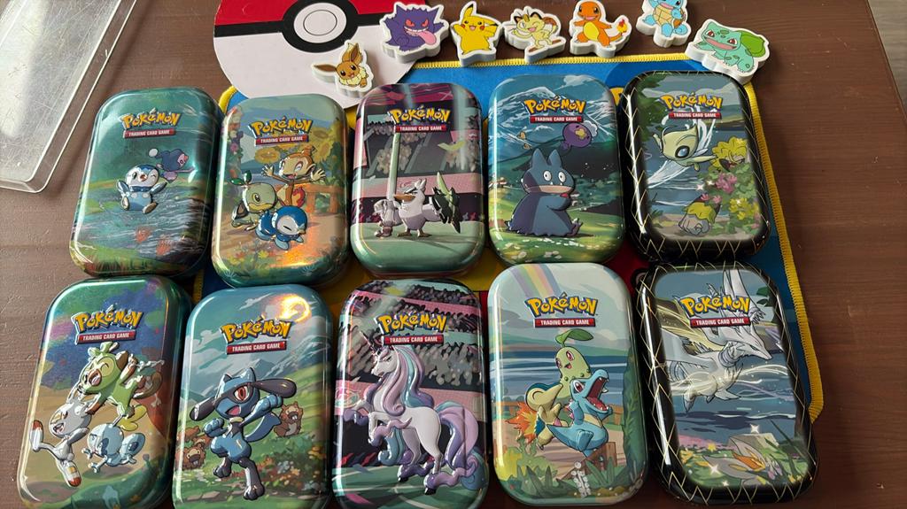 Mystery pokemon tin + inhoud